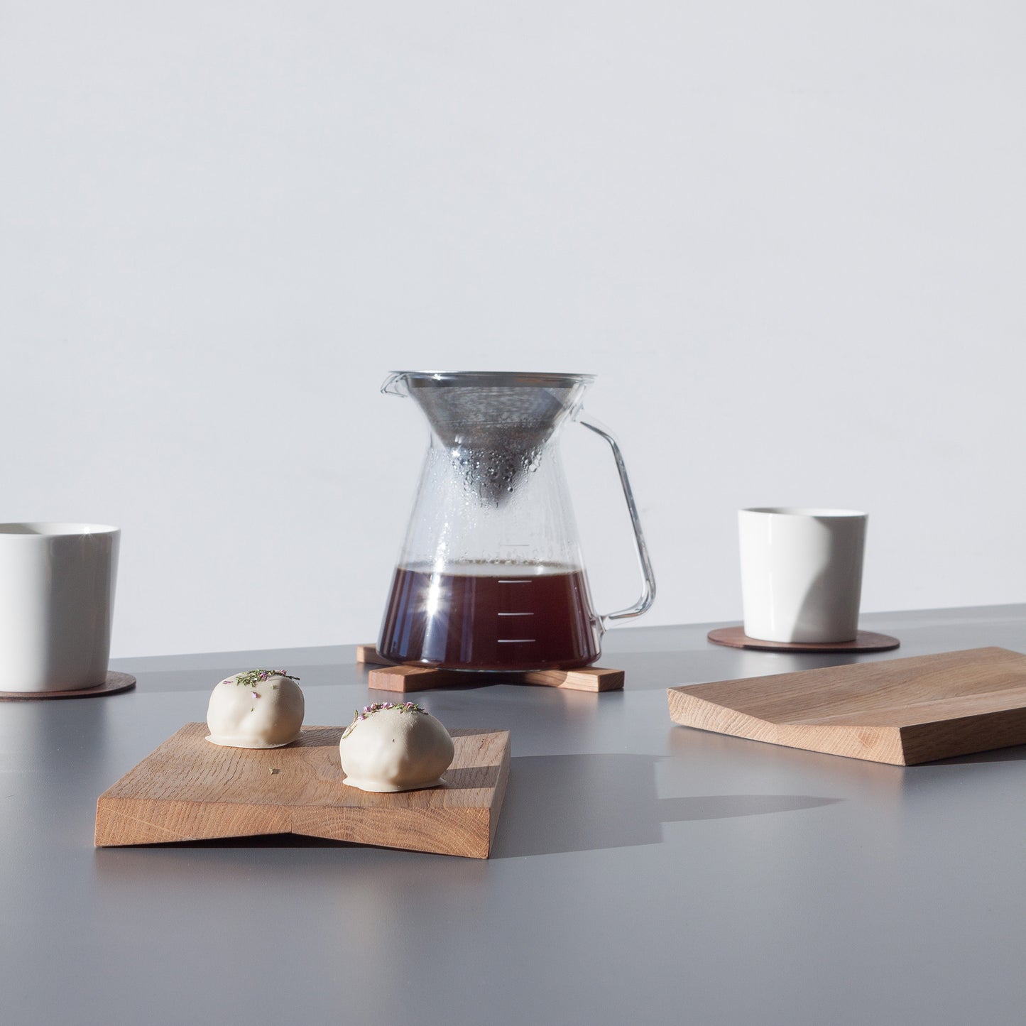 Gourmet food on nordic minimal serving boards from estonain design brand Minumo in sunshine